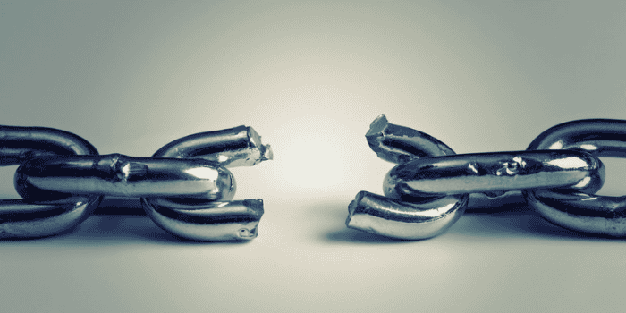 Conflict in business concept with broken chain.