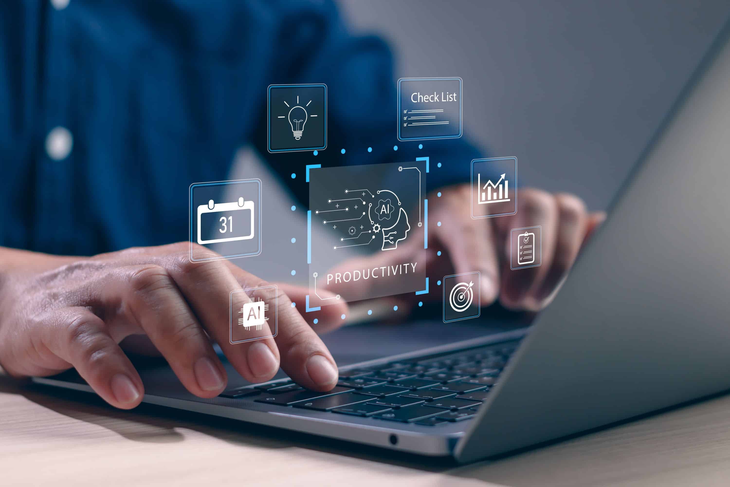 Businessman using AI technology on laptop to boost productivity, manage tasks and automate workflow. Innovation concept of artificial intelligence in modern digital workplace.
