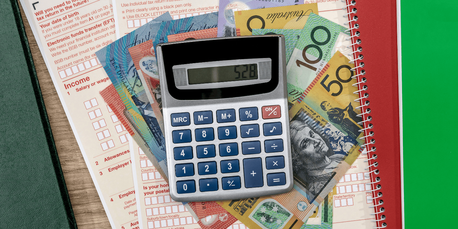 Australian dollars with calculator and tax form